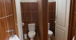 A house with a garden and a restaurant with panoramic views of the ocean and the city.