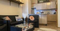 A house with a garden and a restaurant with panoramic views of the ocean and the city.