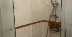 A house with a garden and a restaurant with panoramic views of the ocean and the city.