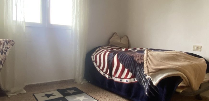 A house with a garden and a restaurant with panoramic views of the ocean and the city.