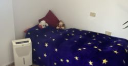 A house with a garden and a restaurant with panoramic views of the ocean and the city.