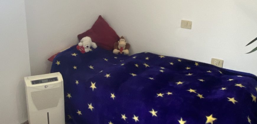 A house with a garden and a restaurant with panoramic views of the ocean and the city.